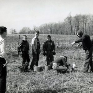 00-00-0000 Arthur White, scoutmaster, Mansfield Troop 102 sponsored by !st Christian Church as he instructs a group of scouts in tree planting at Camp Avery Hand. -0001