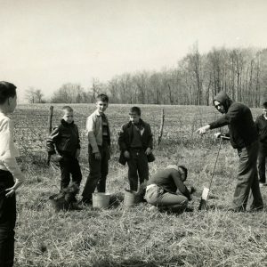 00-00-0000 Arthur White, scoutmaster, Mansfield Troop 102 sponsored by !st Christian Church as he instructs a group of scouts in tree planting at Camp Avery Hand. -website