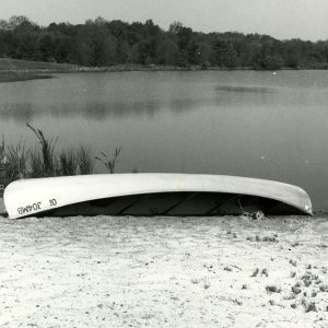 00-00-0000 Canoe on beach of pond-website