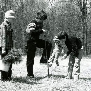 00-00-0000 Four boys planting tree seedlings-website