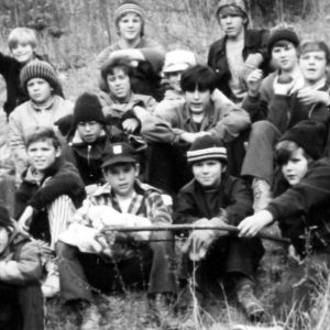 00-00-0000 Large group sitting on ground. Photo by Robert Mills