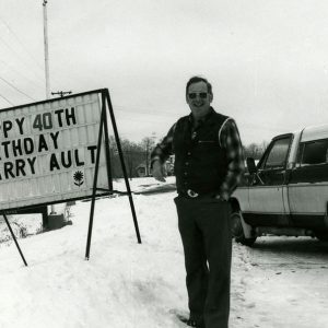 00-00-0000 Larry Ault with 40th birthday sign#2-website