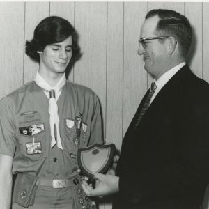 00-00-0000 Man handing award to a scout in uniform-0001