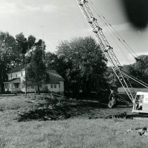 01-04-1965 Ken Murie of R. Getz on dragline shown as construction was completed. H.Snavely pond-website