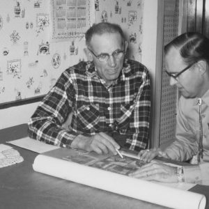 01-24-1969 John Simmons & Dean Swigart look over plans-Photo byRobert Mills