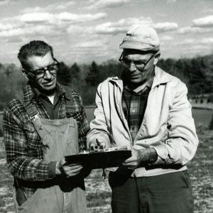 04-07-1976 Claude Schickling of Pine Grove Nursery & Robert Mills examine the order sheet listing Wildlife Packet stock needs-website