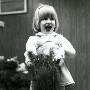 04-19-1980 Anne Mathes shows delight over her wildlife packet at Ag center-website