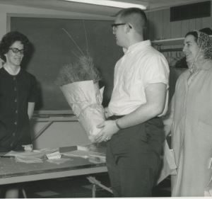 04-23-1965 Wildlife packet pick-up. L-R. SWCD Clerk Nancy Bardell, Mrs. Howard Close & son-edited