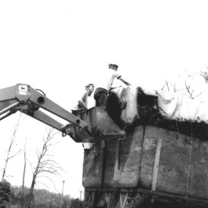 05-16-1974 Wade and Gatton tarping down trees for transport-0001