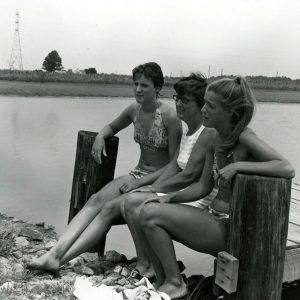 07-15-1975 Mrs. Metger and daughters Marianne and Patty at family pond in Richland Cty-website