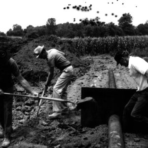 07-17-1975 Dan Cooper and Dean Swigart and George Smith covering pipe at Bill Evans Pond-website