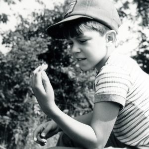 08-20-1975 Loren Kranz eyeing a caterpillar-0001