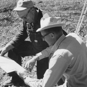 10-01-1963 Gene Spoerr & Dean Swigart looking @ plans- Photo by Robert Mills