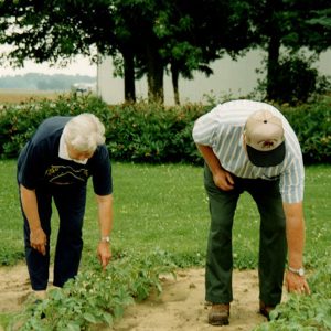 2004 Ken Adams with ______in garden#1-website