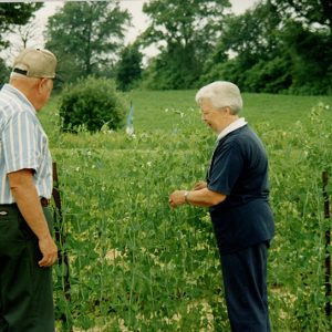 2004 Ken Adams with ______in garden#2-website