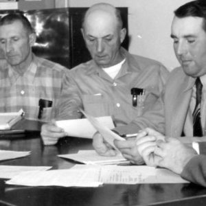 Five Men sitting at table-0005.Photo by Robert Mills