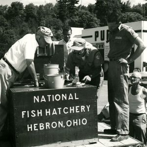 J.A. Brennan(Center-U.S. fish & wildlife service) as he delivered bass & bluegill to (LtoR) Chester Hampton, Davide Westfield, Lynn McCammon,&Paul Walker of Bellville-website