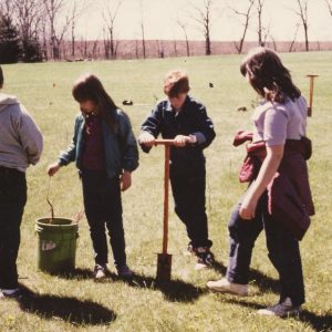 Unidentified children planting trees.Date unknown-0001