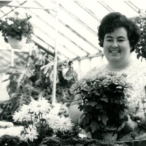 Woman in greenhouse with flowers-0001