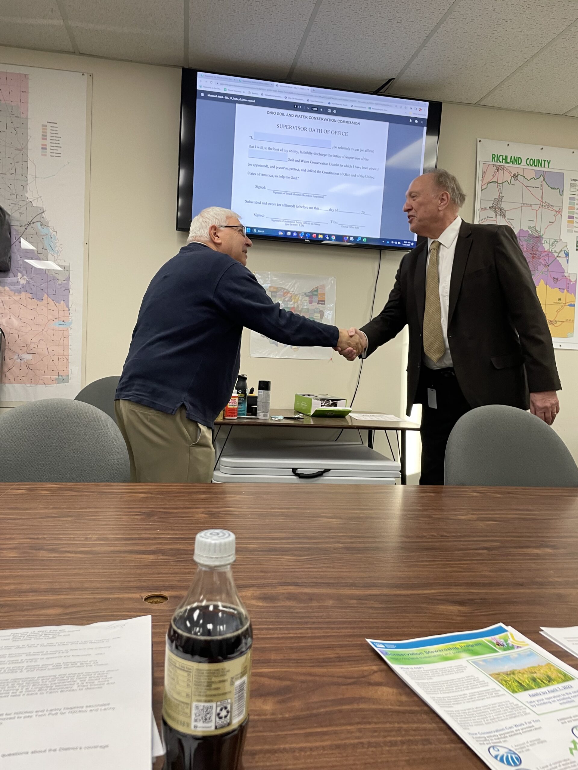 Commissioner swearing in Rick Novak