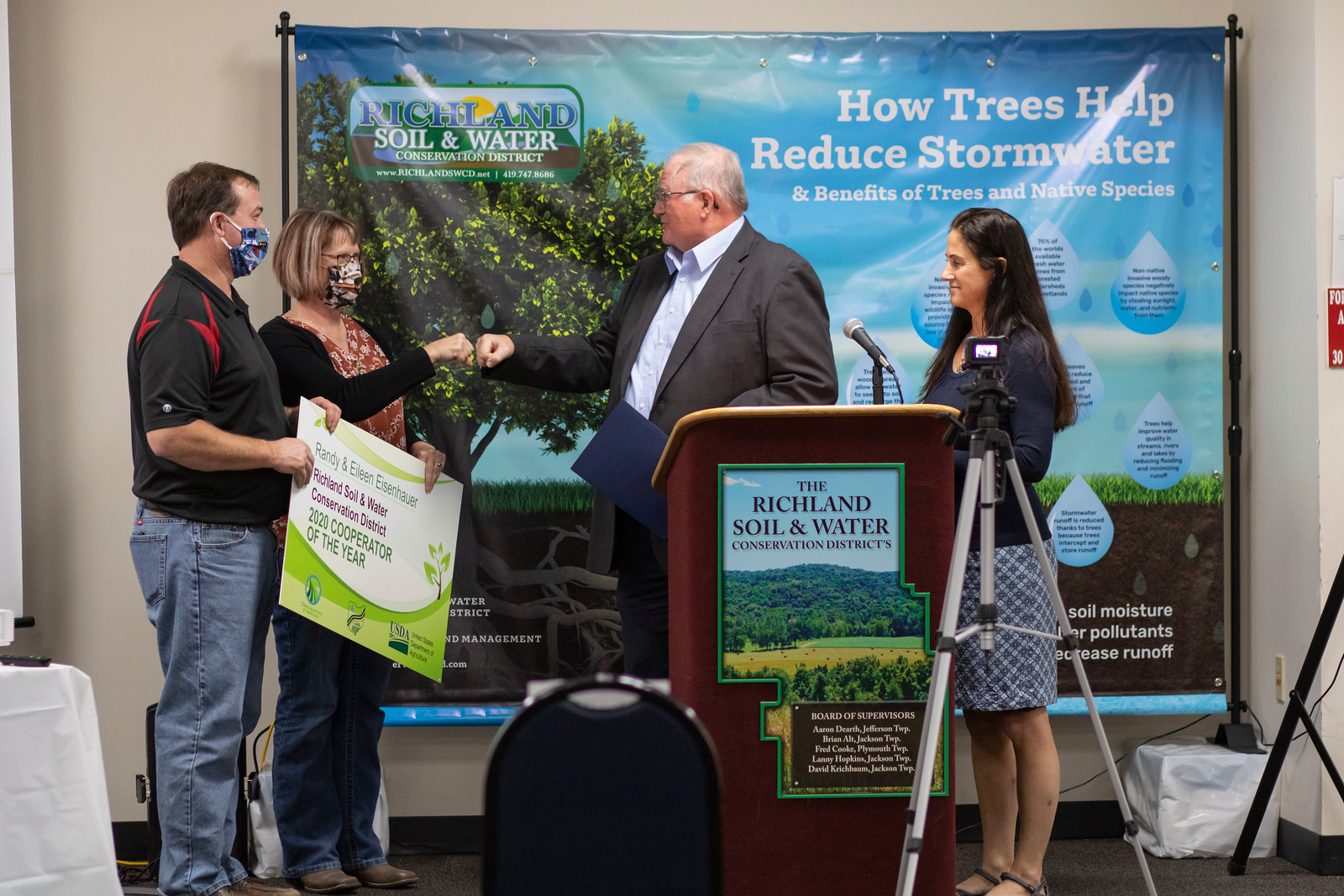 Eisenhauer, Randy and Eileen, Cooperators of Year; Commissioner Darrell Banks; Thomas, Erica Richland SWCD Director