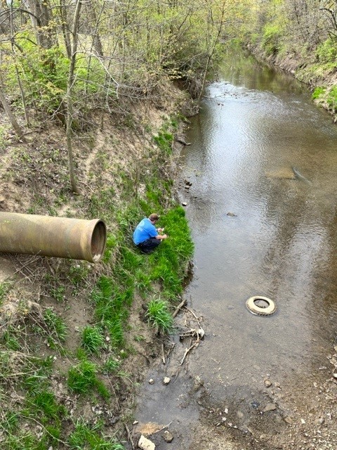 Matt, SWCD Technician taking control sample upstream