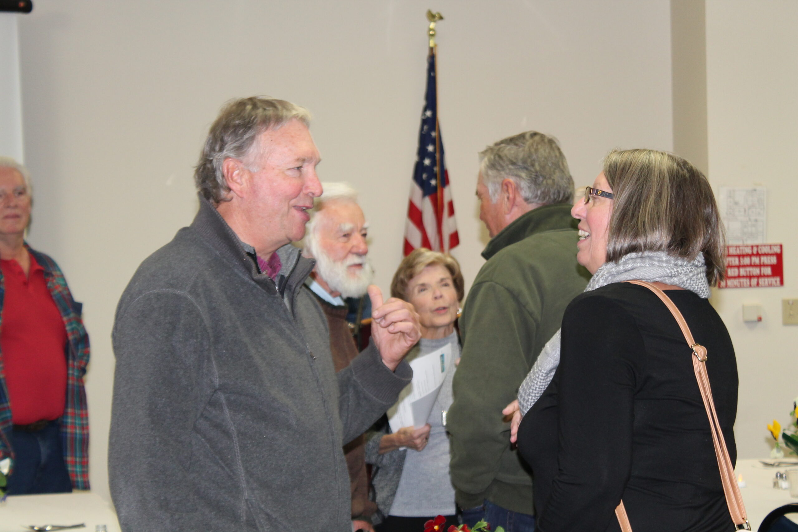 Meek, Win speaking to Milliron, Grant and Herrold, Mary Lou