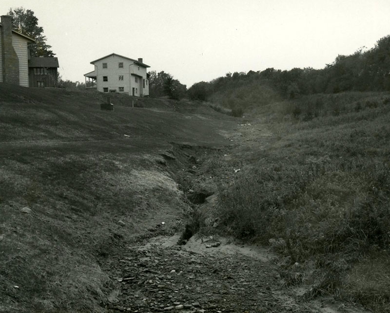 Eroded waterway near homes
Photo ID#: RSWCD563