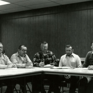 00_00_0000_Five_men_sitting_at_table_Website-5799