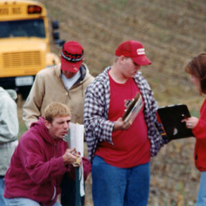 00_00_0000_Group_in_field__one_checking_slope_Website-5607