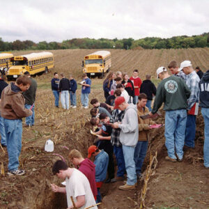 00_00_0000_Group_of_students_in_field_some_in_trench_1_Website-5608