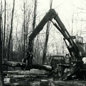 00_00_0000_Large_equipment_preparing_to_lift_log_on_flat_truck_website-5837