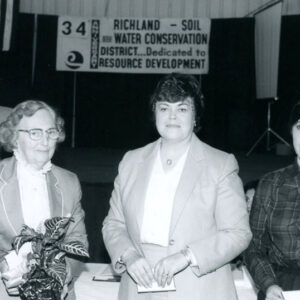 00_00_0000_Three_women_at_Annual_Meeting.__Looks_like_Dick_Forbes_in_backgroundd__website-3609