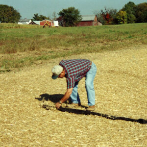 00_00_0000_Tim_Brandt__District_Tech__checking_sod_waterway_installation_Website-5824