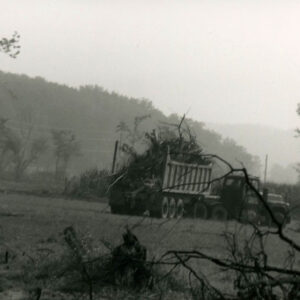 00_00_0000_Truck_carrying_tree_rubble__looks_like_flood_aftermath_website-5408