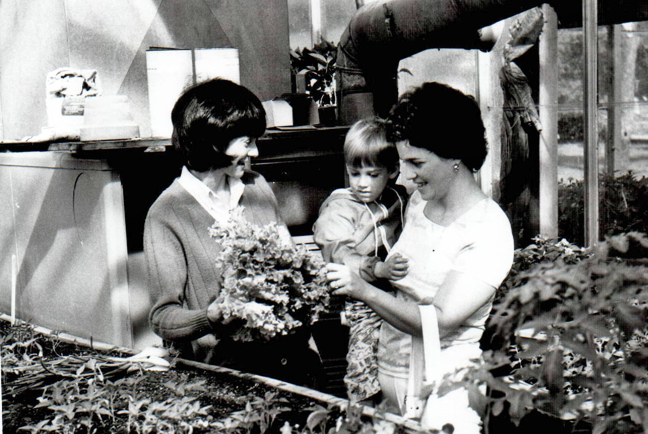 Two womaen with a child at the tree nursery
Photo ID#: PL17