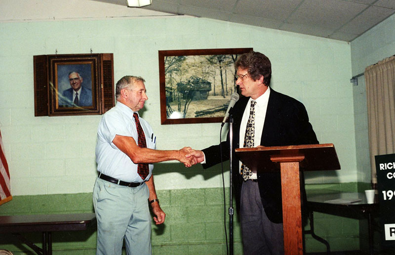 1998 Annual Meeting
Charles Winger presenting Richard Forbes the Goodyear Cooperator of the Year Award 
Photo ID#: RSWCD638