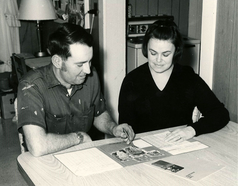 February 6, 1973
Mr. and Mrs. Tom Kranz examine the conservation plan which Tom uses on his farm
Photo ID#: A246
 