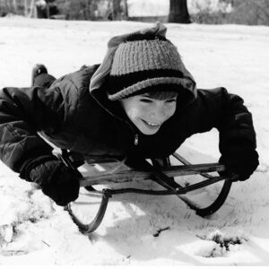 03_05_1972_Tod_Mills_enjoys_sliding_down_hill_on_his_sled_website-2935