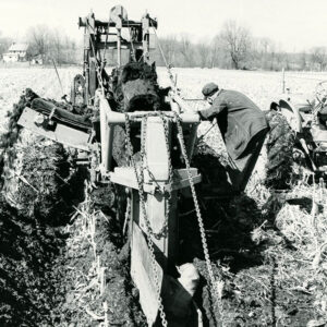 03_18_1968_Tile_drainage_contractor_Harold_company_installing_tile_at_the_John_Winger_Farm__Mifflin_Twp_website-1281