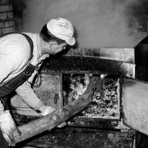 03_30_1965_Dave_Culler_tending_to_wood_stove_website-1124