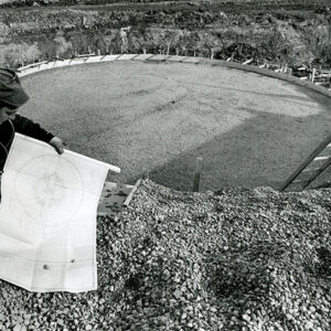 04_01_1969_Two_huge_filtration_tanks_are_being_formed_at_the_Eastview_area_sewage_treatment_plant_off_Fleming_Falls._Joe_Cooper_plant_construction_supt_studies_a_blueprint_website-3121