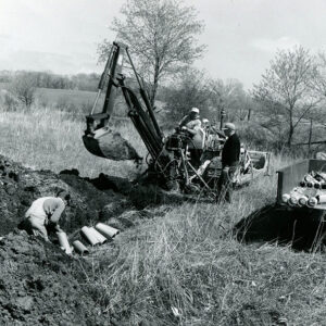 04_19_1967_Backhoe_installation_of_drain_tile._John_Phillips_at_Chester_Hampton_s_website-1283