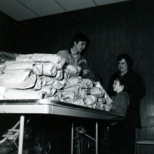 04_19_1975_Jeff_Van_Loon__Mrs._Hershel_Bugg__Tracy_Bugg__boy__Richland_SWCD_WP_Tree_Pick_up_website-4358