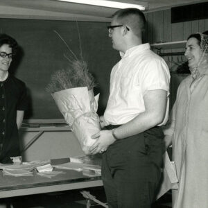 04_23_1965_Wildlife_packet_pick_up._L_R._SWCD_Clerk_Nancy_Bardell__Mrs._Howard_Close___son_website-4359