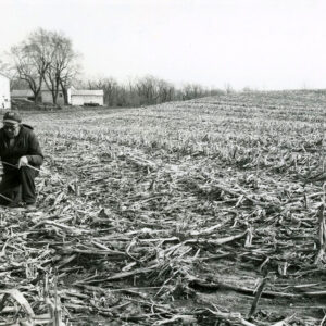 04_30_1980_Ken_Ernst_checking_soil_temp_in_no_till_corn_field_website-5217