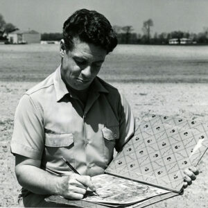 05_06_1964_Soil_Scientist_C.Edward_Redmond_plots_soil_boundaries_on_an_aerial_photo_after_examining_soil_website-3650