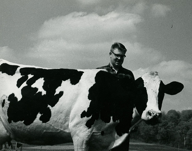 May 11, 1966
Floyd McFarland Farm
Lonnie McFarland with a top-producing dairy cow
Photo ID#: A341