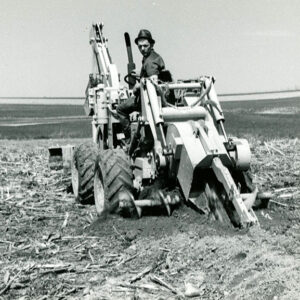 05_12_1972_John_Gingrich_from_Millersburg_installing_plastic_tubing__4_in__at_Clarence___Richard_Forbes_Farm_website-1289
