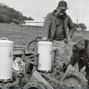 05_13_1969_Dale_Cook_and_Raplh_Winter_at_Cook_s_farm_examine_planting_done_by_Ralph_s_new_AC_no_till_2_row_planter0001-2311